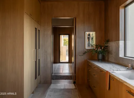 a kitchen with a sink and a stove