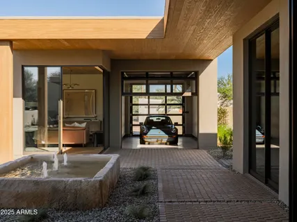 a kitchen with a table and chairs in it