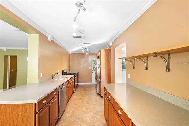 a bathroom with a double vanity sink a mirror and a bathtub