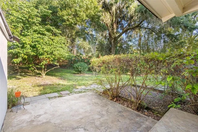 a view of backyard with green space