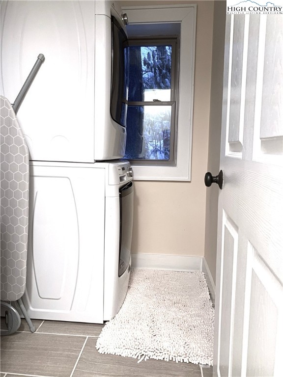 702 Pine Ridge Road Beech Mountain, NC 28604 - Photo 14 of 24 a view of a room that has a washer and dryer