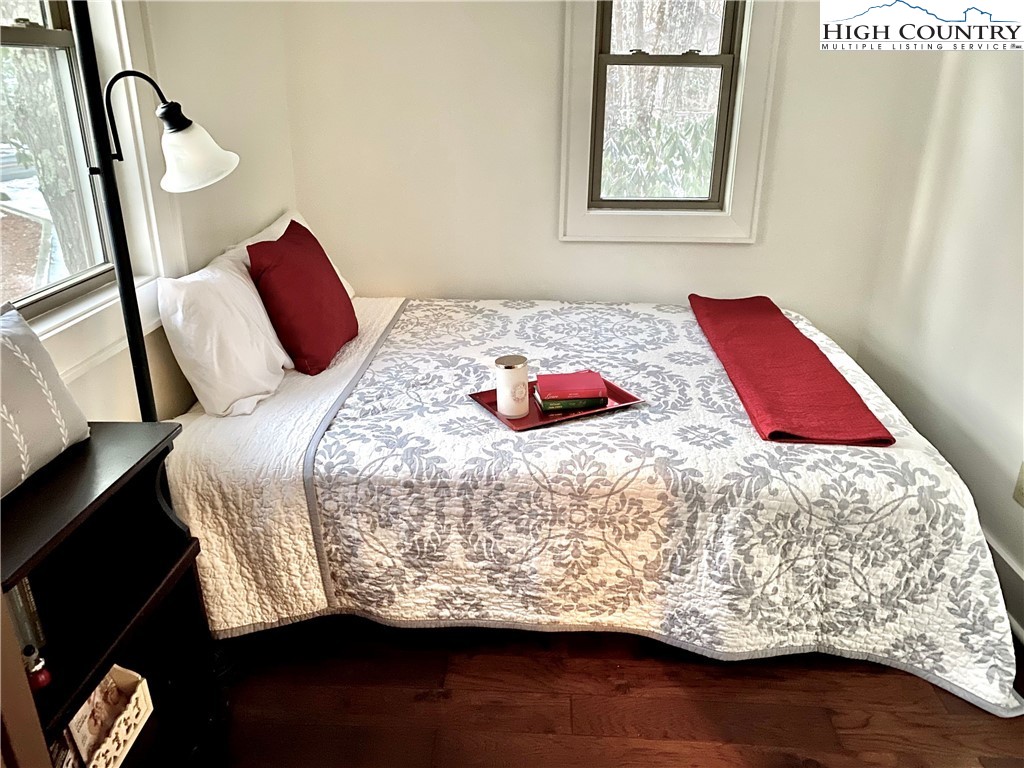 702 Pine Ridge Road Beech Mountain, NC 28604 - Photo 17 of 24 a bedroom with a bed and a window