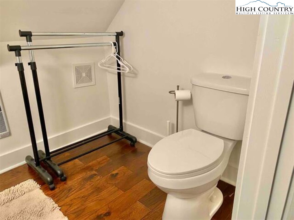 702 Pine Ridge Road Beech Mountain, NC 28604 - Photo 20 of 24 a bathroom with a toilet and a shower