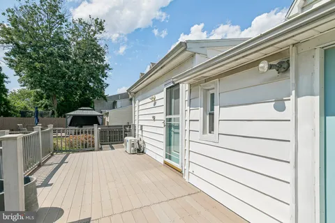 a balcony view with a seating space