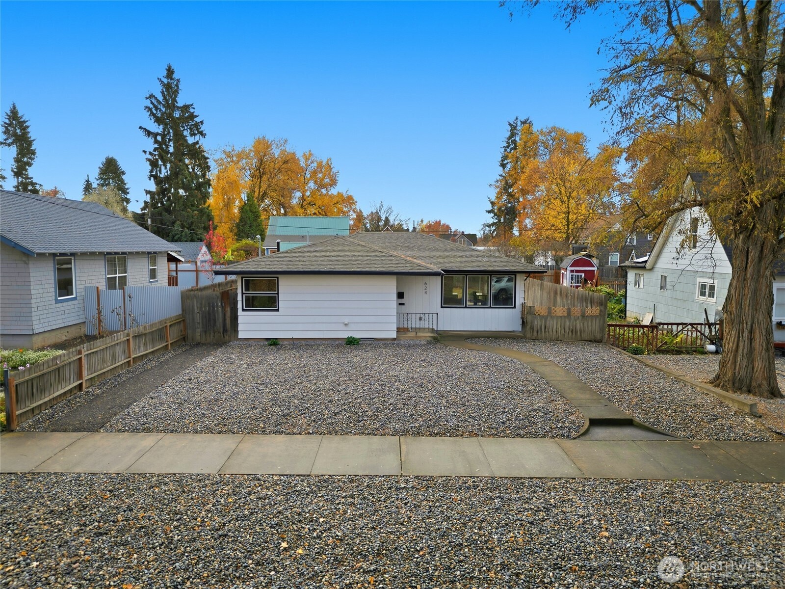 624 Juniper Street Walla Walla, WA 99362 - Photo 24 of 25 a front view of a house with a yard and garage