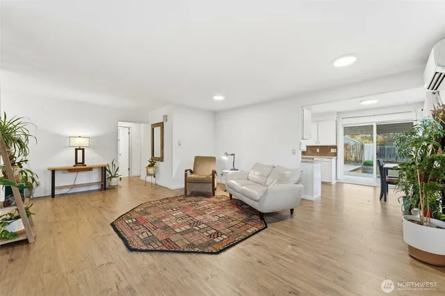 a living room with furniture and a table