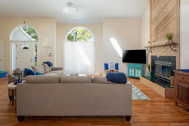 a spacious bedroom with a bed and furniture