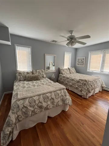 a view of deck with wooden floor and outdoor seating