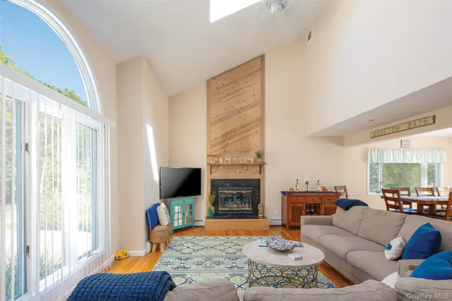 a kitchen with stainless steel appliances granite countertop a refrigerator stove top oven and a sink