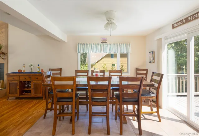 a bathroom with a bathtub a sink and a mirror