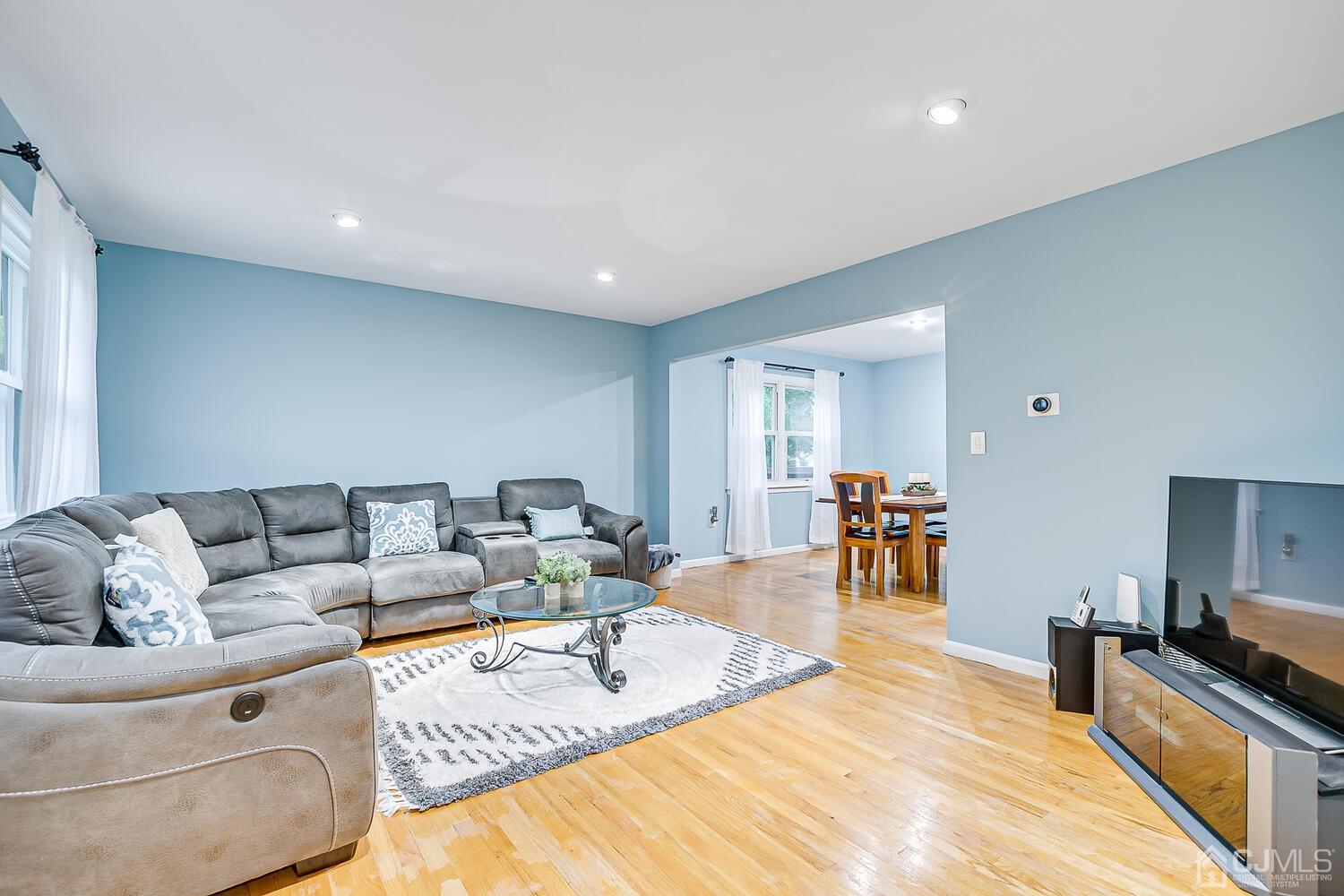937 New Dover Road Edison, NJ 08820 - Photo 11 of 51 a living room with furniture and a wooden floor