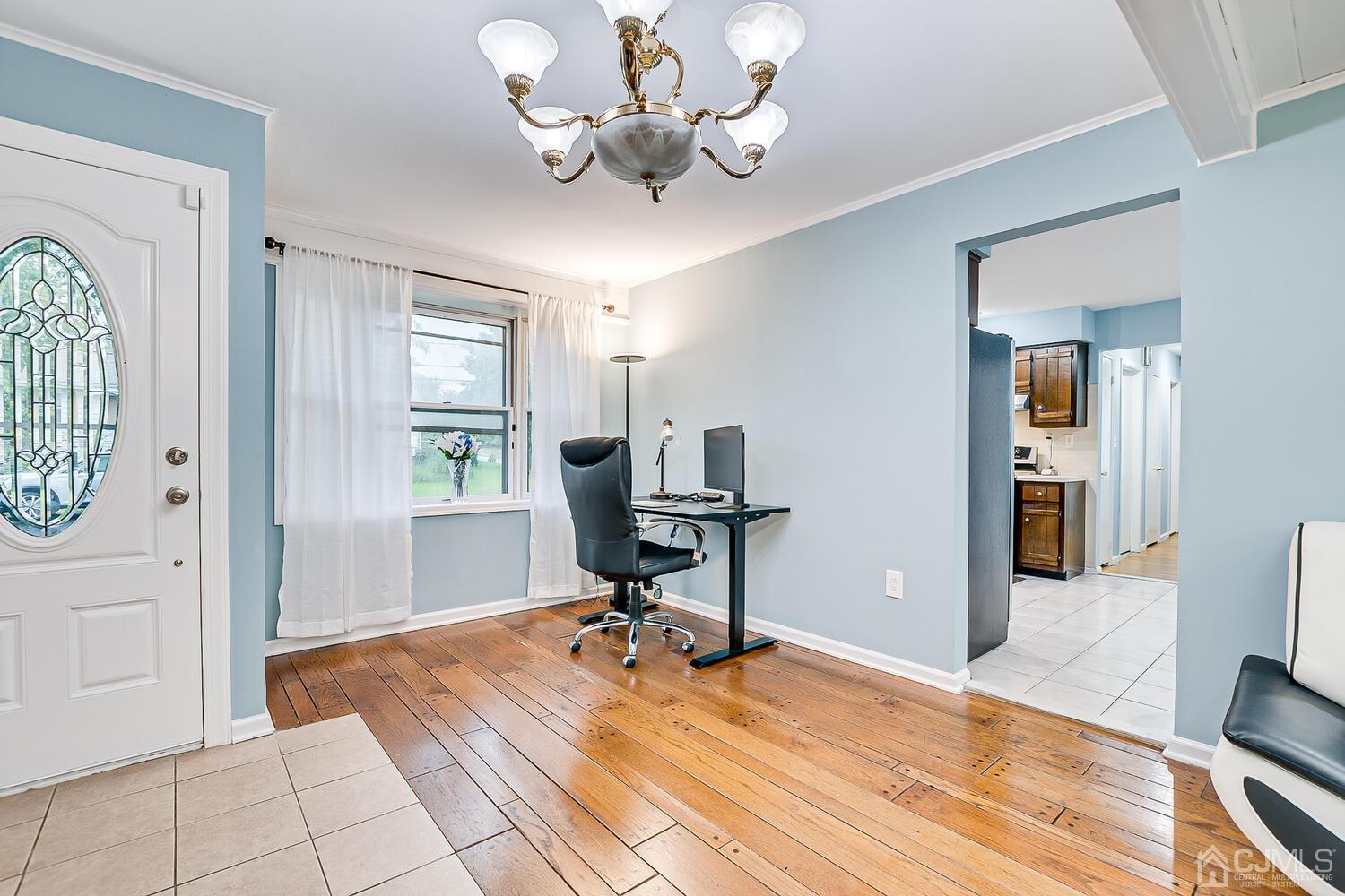 937 New Dover Road Edison, NJ 08820 - Photo 25 of 51 a view of a livingroom with a chandelier