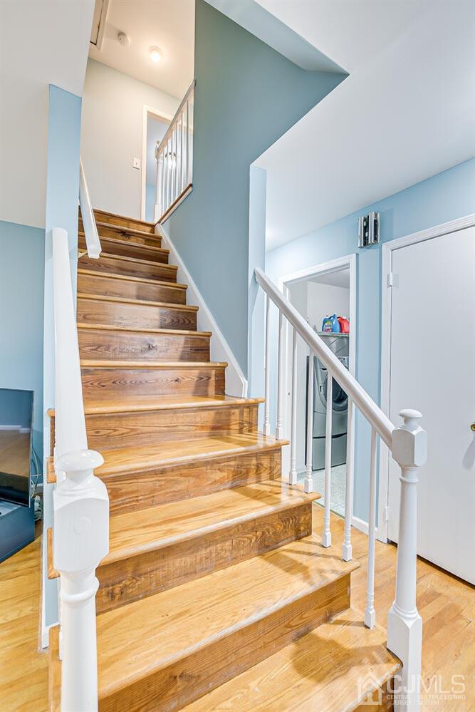 937 New Dover Road Edison, NJ 08820 - Photo 28 of 51 a view of entryway and hall with wooden floor