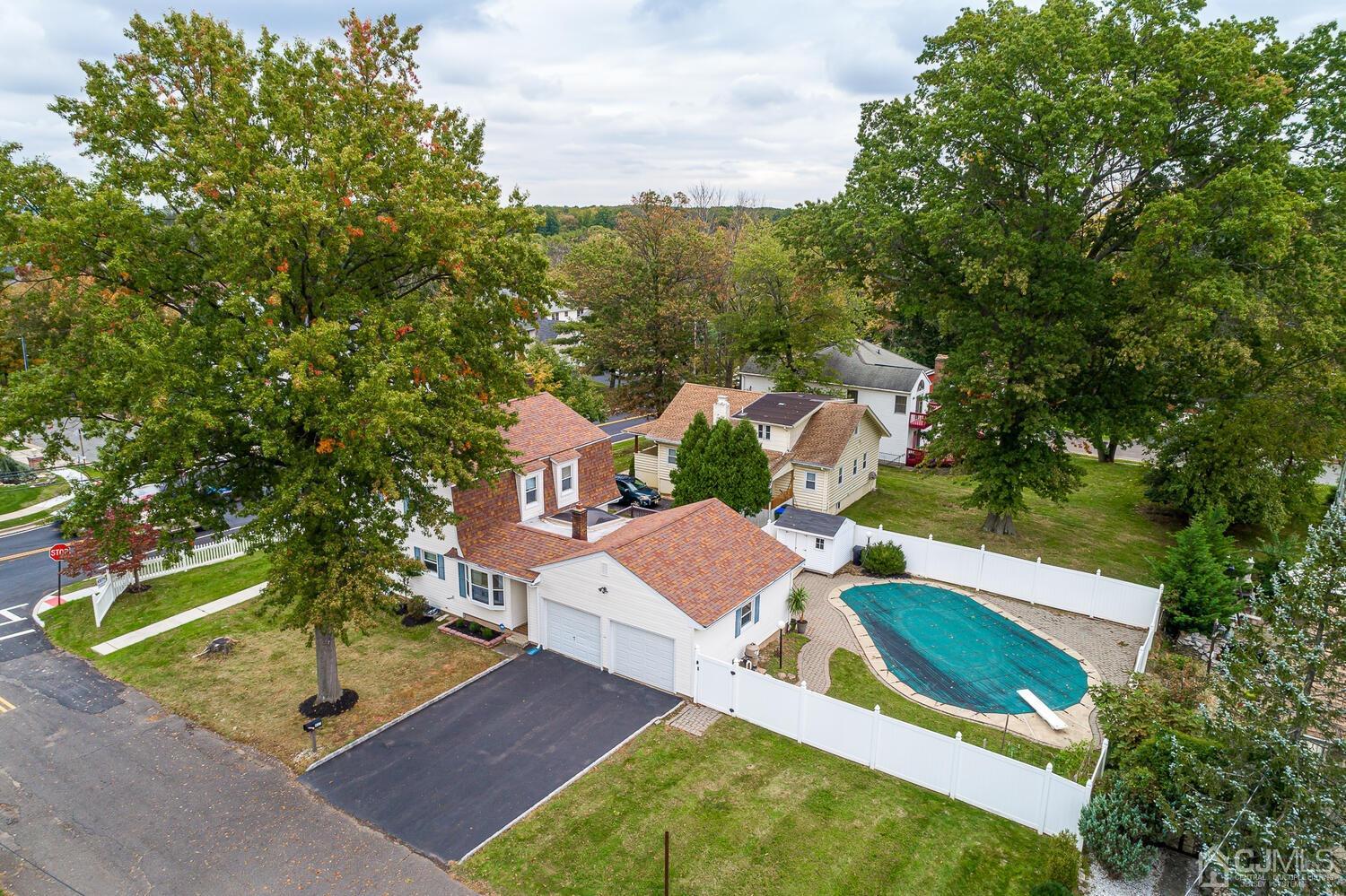 937 New Dover Road Edison, NJ 08820 - Photo 4 of 51 an aerial view of a house with a yard