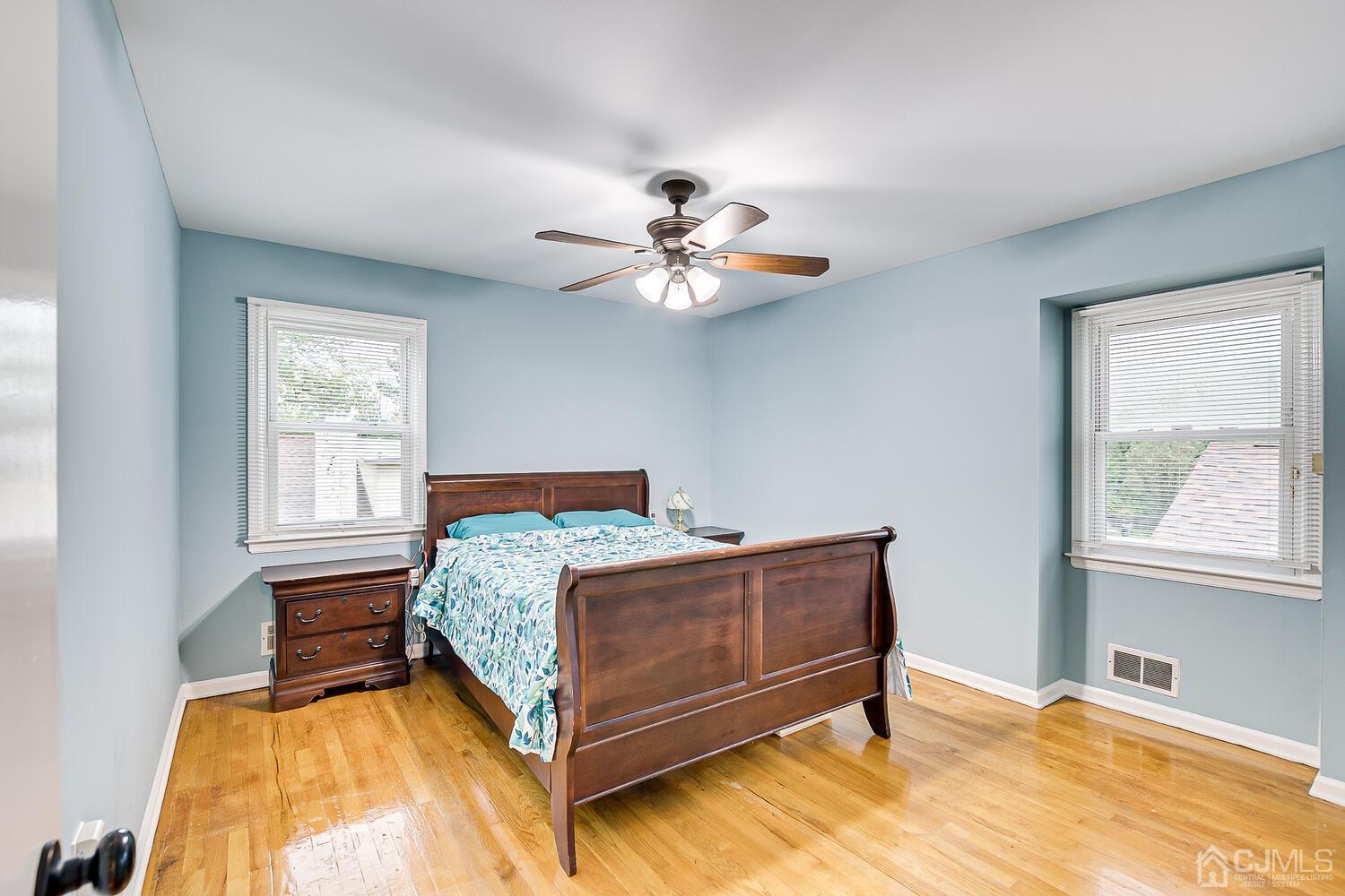 937 New Dover Road Edison, NJ 08820 - Photo 32 of 51 a bedroom with a bed and window