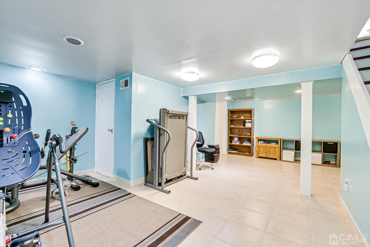 937 New Dover Road Edison, NJ 08820 - Photo 37 of 51 a view of a room with gym equipment
