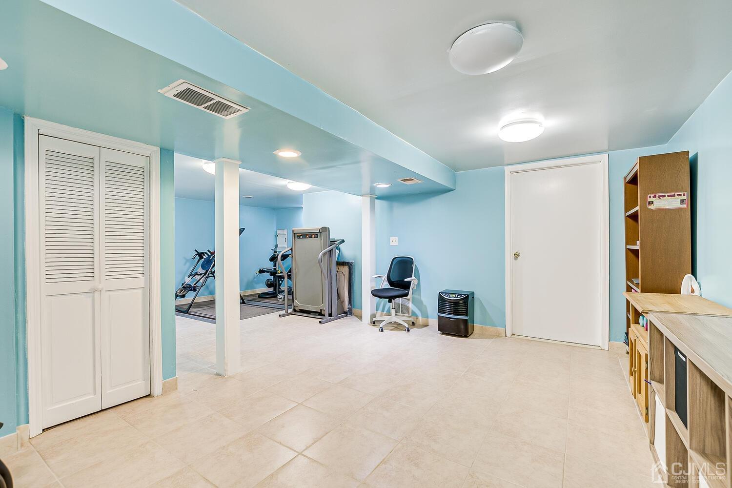 937 New Dover Road Edison, NJ 08820 - Photo 39 of 51 a view of a room with gym equipment