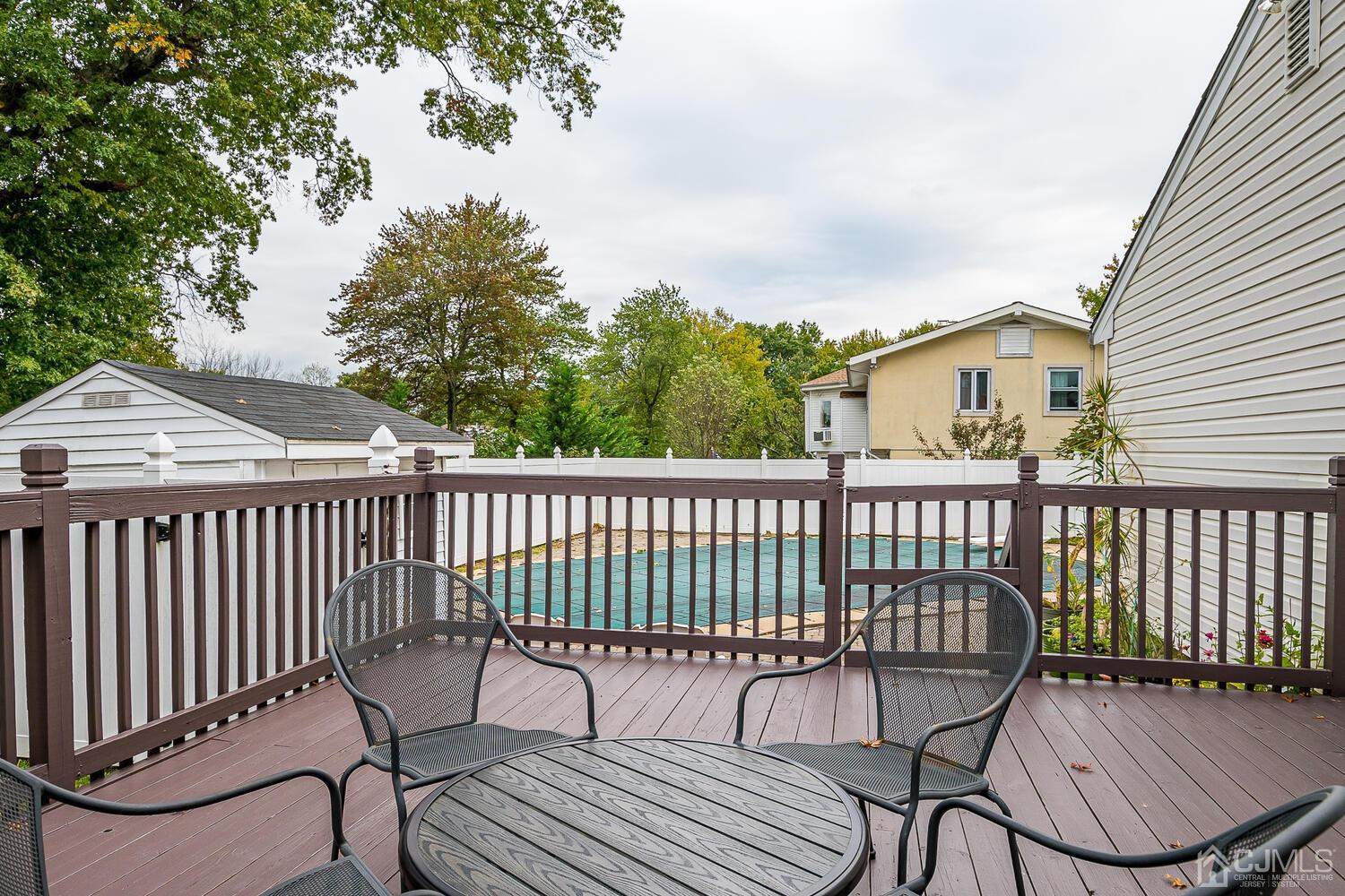 937 New Dover Road Edison, NJ 08820 - Photo 41 of 51 a view of a chair in wooden deck