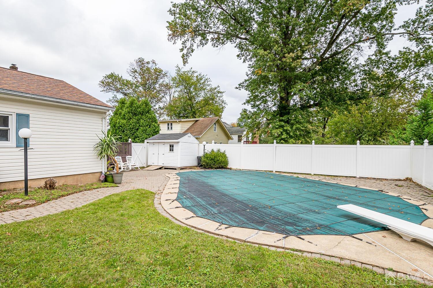 937 New Dover Road Edison, NJ 08820 - Photo 43 of 51 a view of backyard with a garden and trees