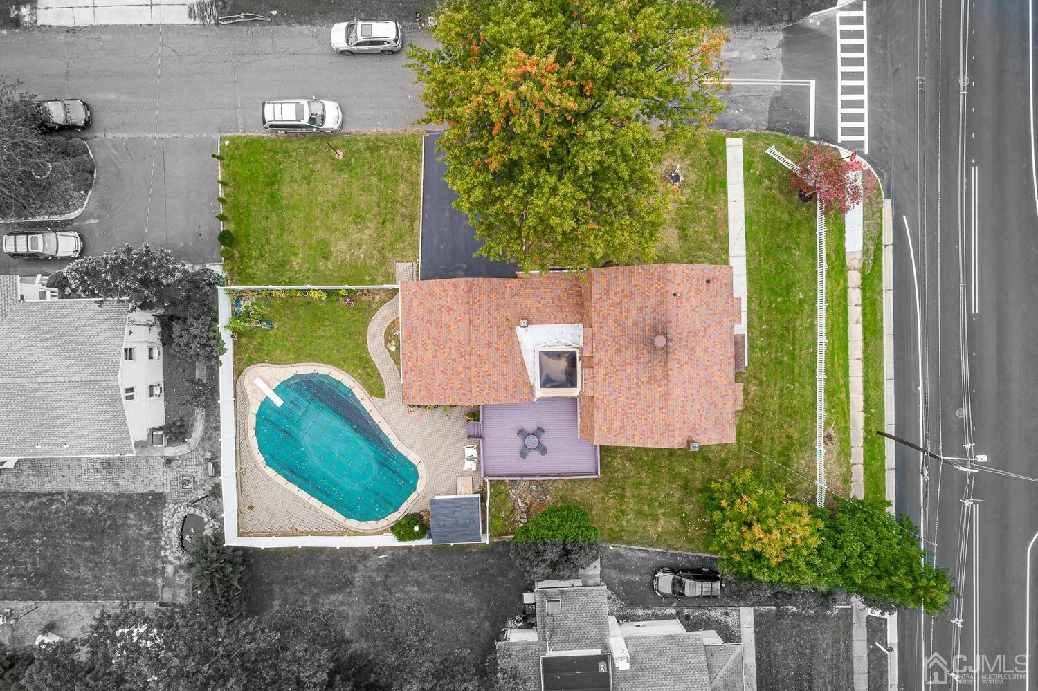 937 New Dover Road Edison, NJ 08820 - Photo 45 of 51 an aerial view of a house with a swimming pool