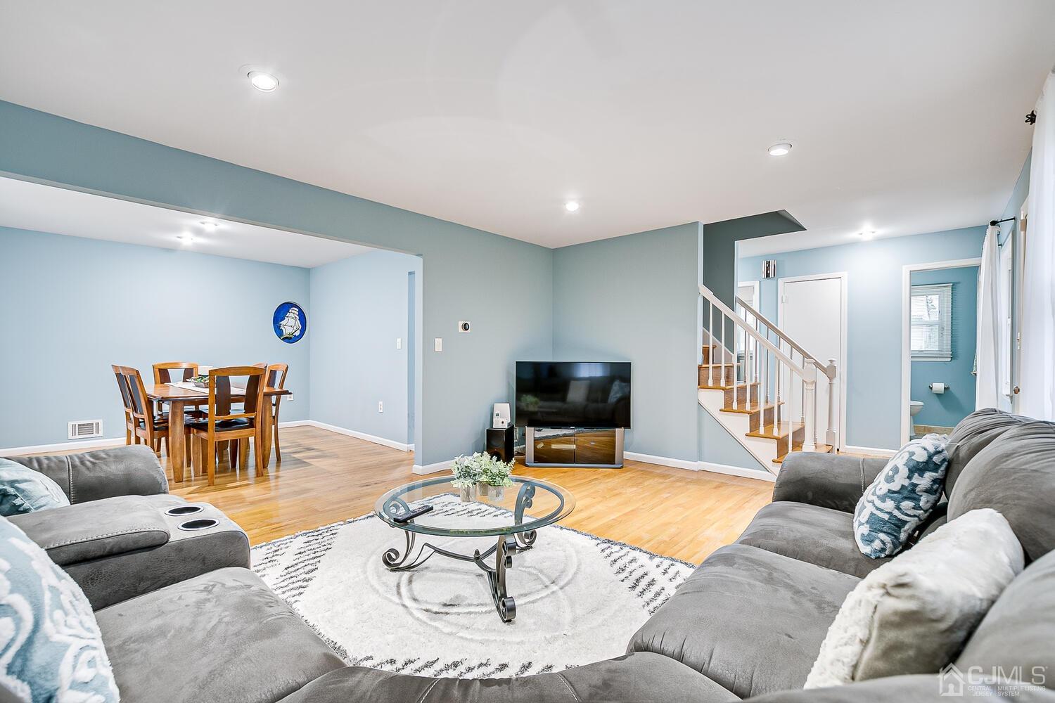 937 New Dover Road Edison, NJ 08820 - Photo 9 of 51 a living room with furniture and a flat screen tv
