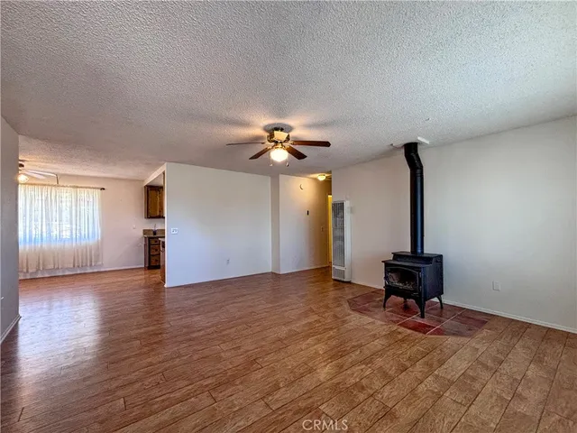 a view of livingroom with furniture and window