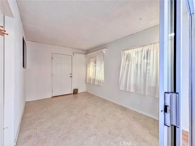 a bathroom with a sink a mirror a toilet and a bathtub