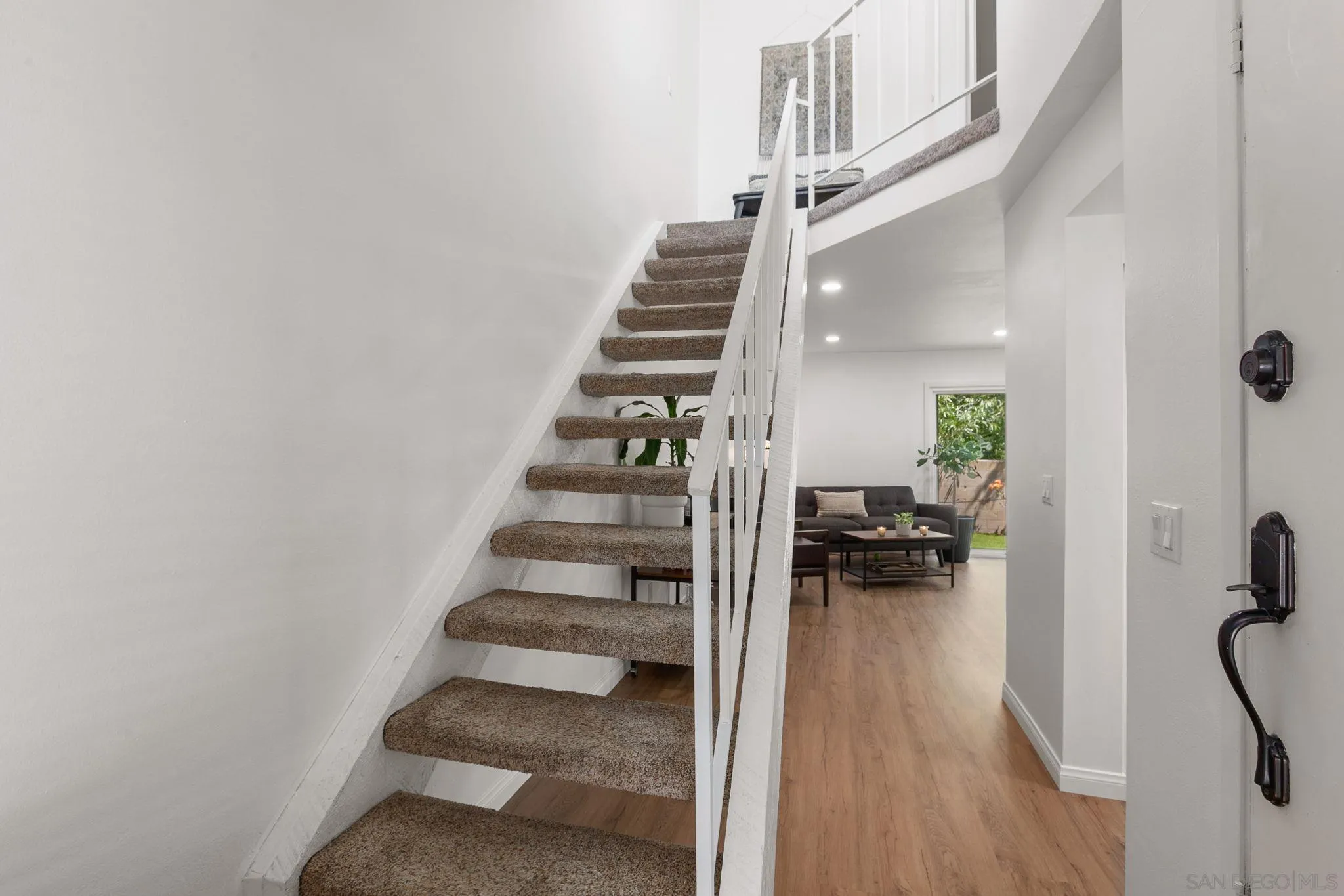14283 Mariana Drive Poway, CA 92064 - Photo 11 of 28 a view of entryway and hall with wooden floor