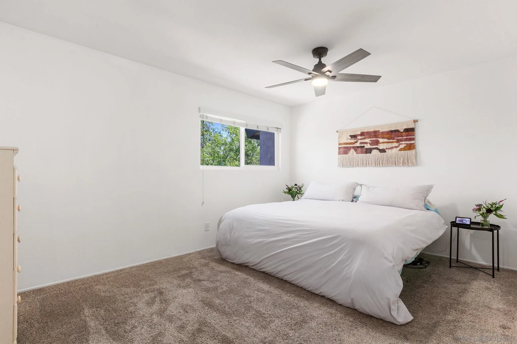 14283 Mariana Drive Poway, CA 92064 - Photo 13 of 28 a bedroom with a bed and a chandelier