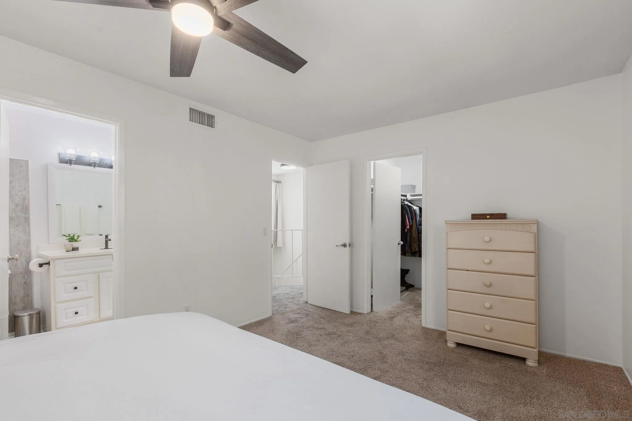 14283 Mariana Drive Poway, CA 92064 - Photo 15 of 28 a room with a dresser and a mirror