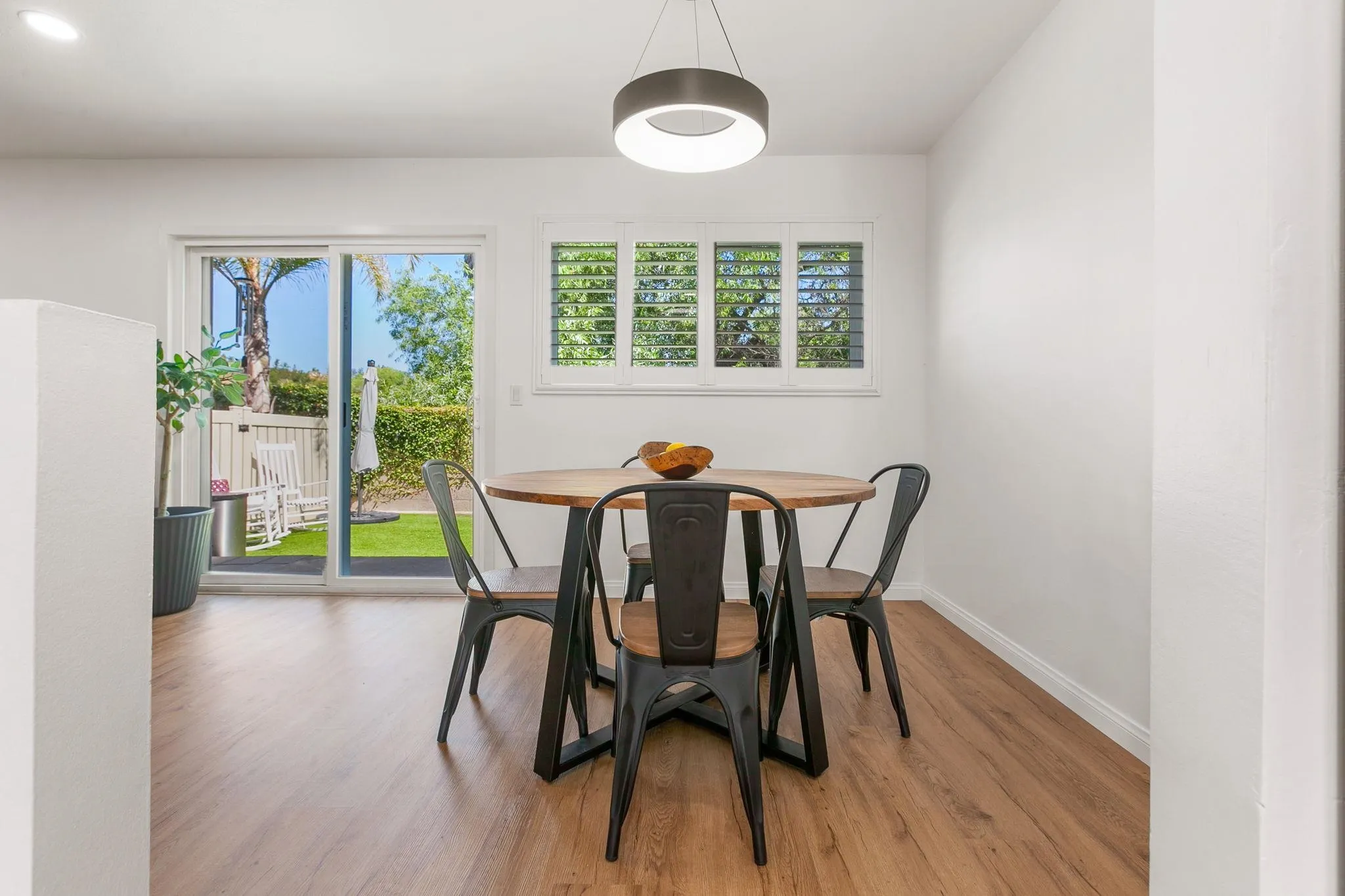 14283 Mariana Drive Poway, CA 92064 - Photo 6 of 28 a view of a dining room with furniture wooden floor and a window