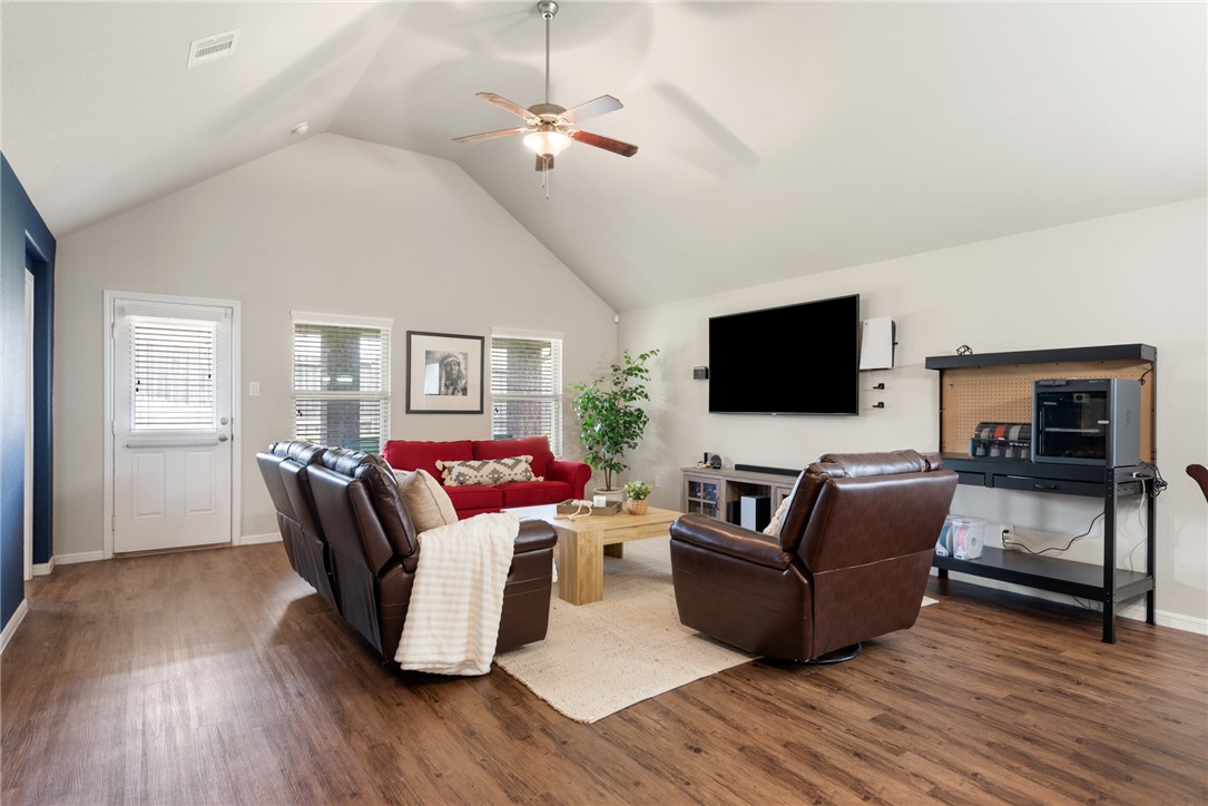 2018 Eagle View Drive Navasota, TX 77868 - Photo 11 of 28 a living room with furniture and a flat screen tv