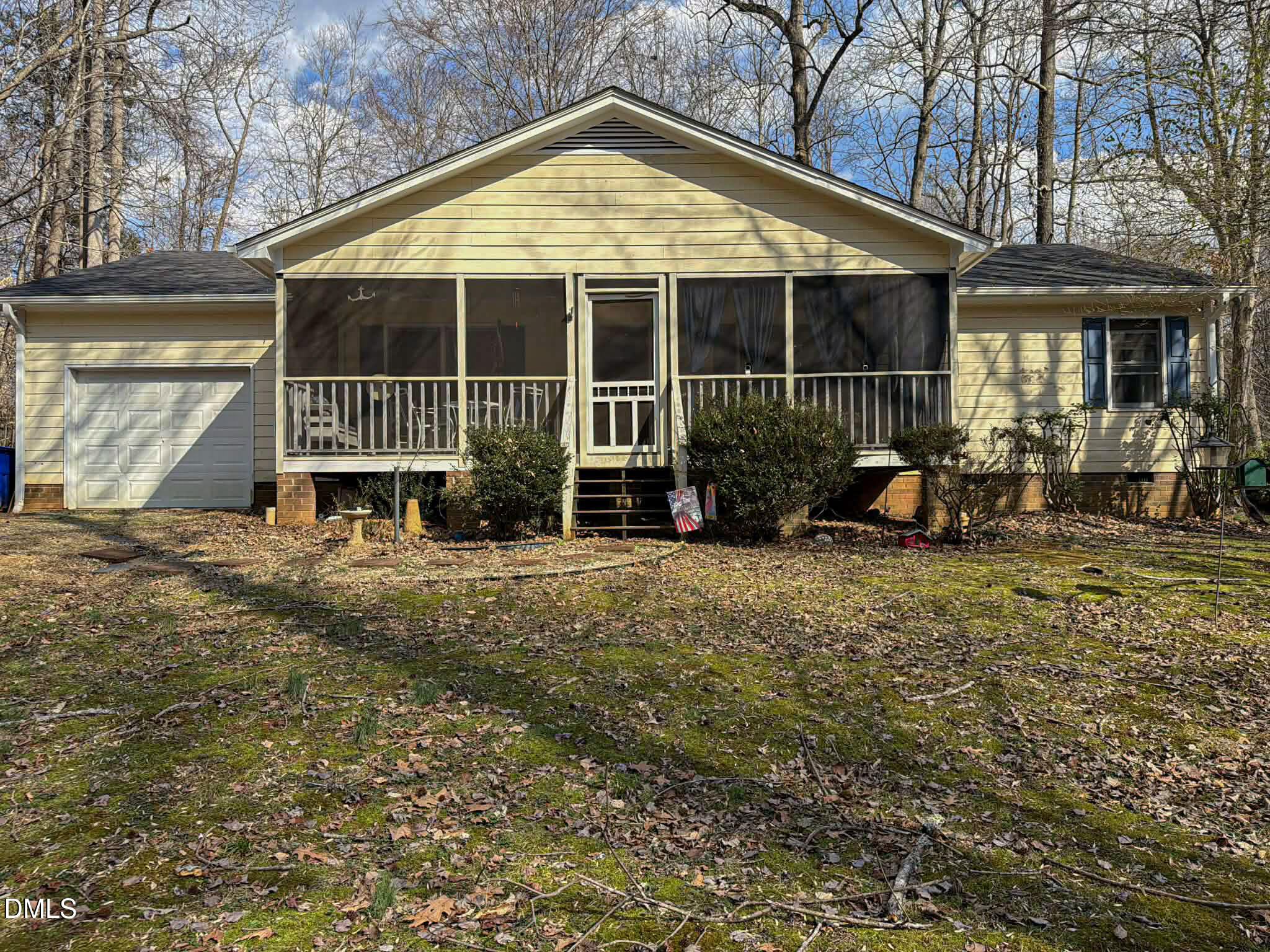 609 Shambley Road Mebane, NC 27302 - Photo 2 of 17 a view of a house with backyard and porch
