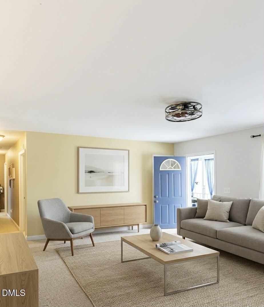 609 Shambley Road Mebane, NC 27302 - Photo 6 of 17 a living room with furniture and a wooden floor