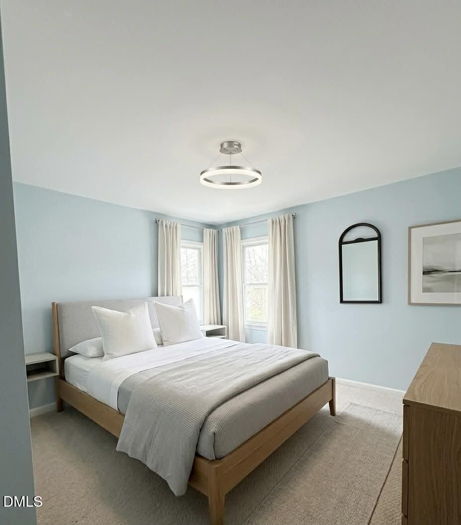 609 Shambley Road Mebane, NC 27302 - Photo 9 of 17 a bedroom with a bed and window