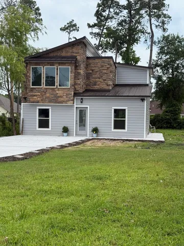 a front view of house with yard