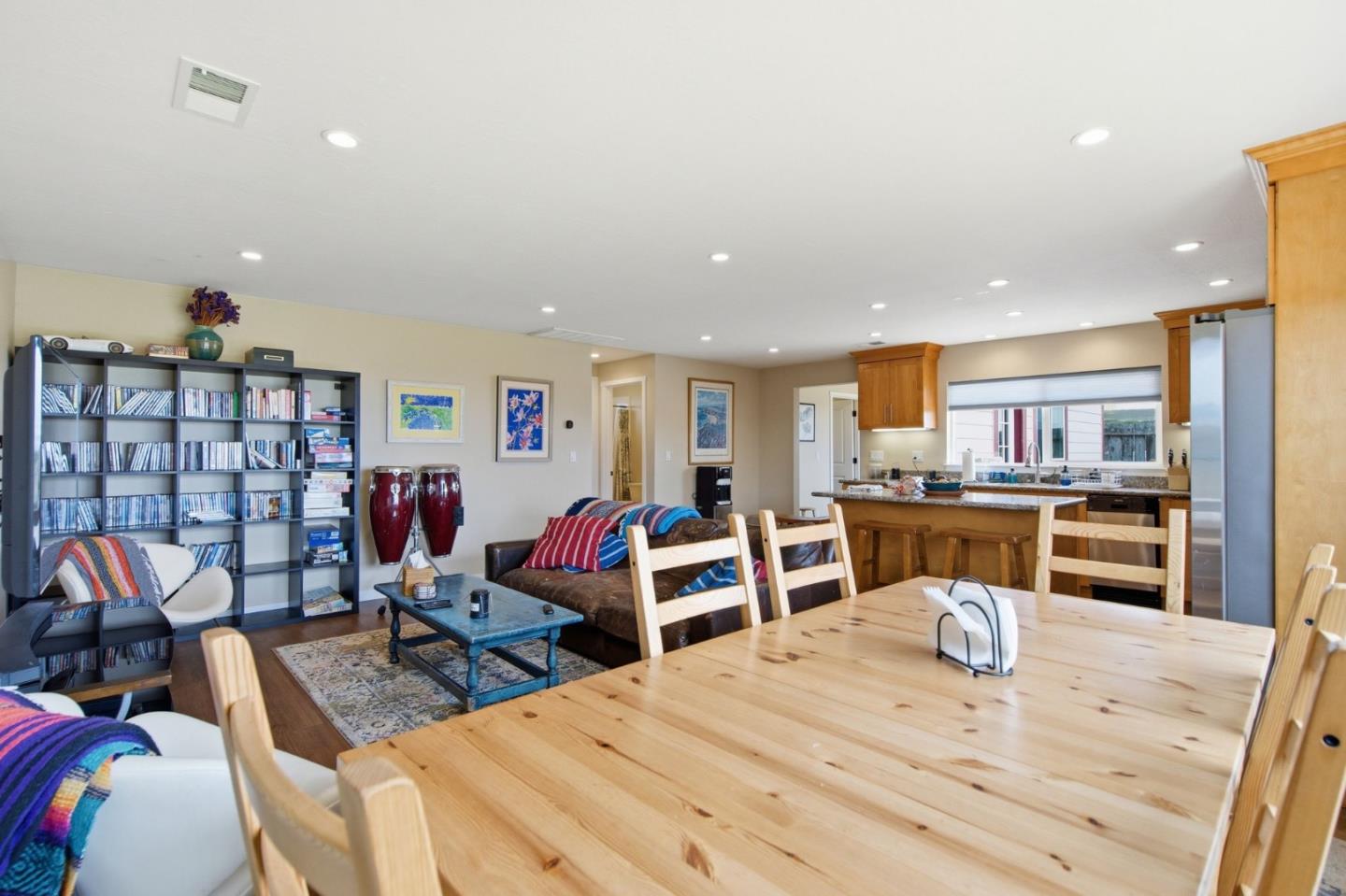 1263 Reservoir Road Pescadero, CA 94060 - Photo 53 of 66 a living room with furniture a table and kitchen view