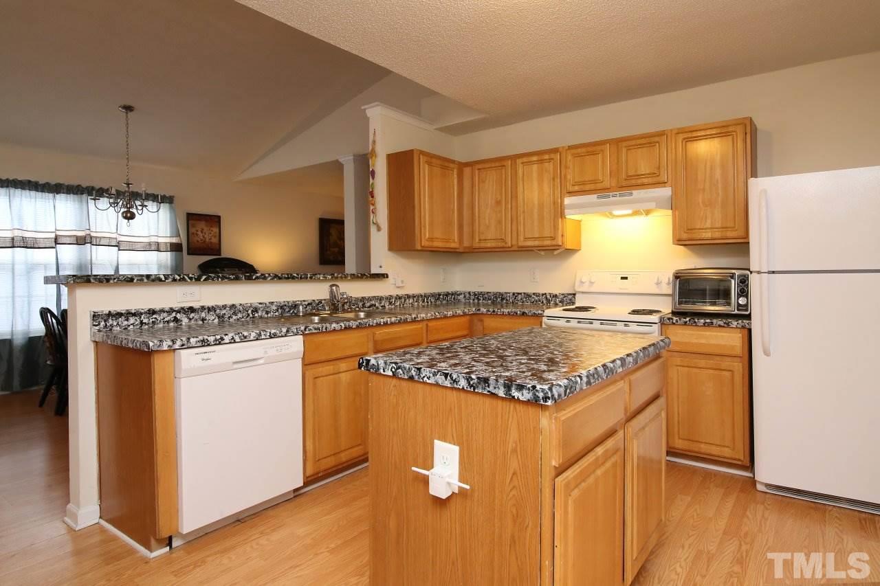 4725 Silverdene Street Raleigh, NC 27616 - Photo 12 of 25 Kitchen with island
