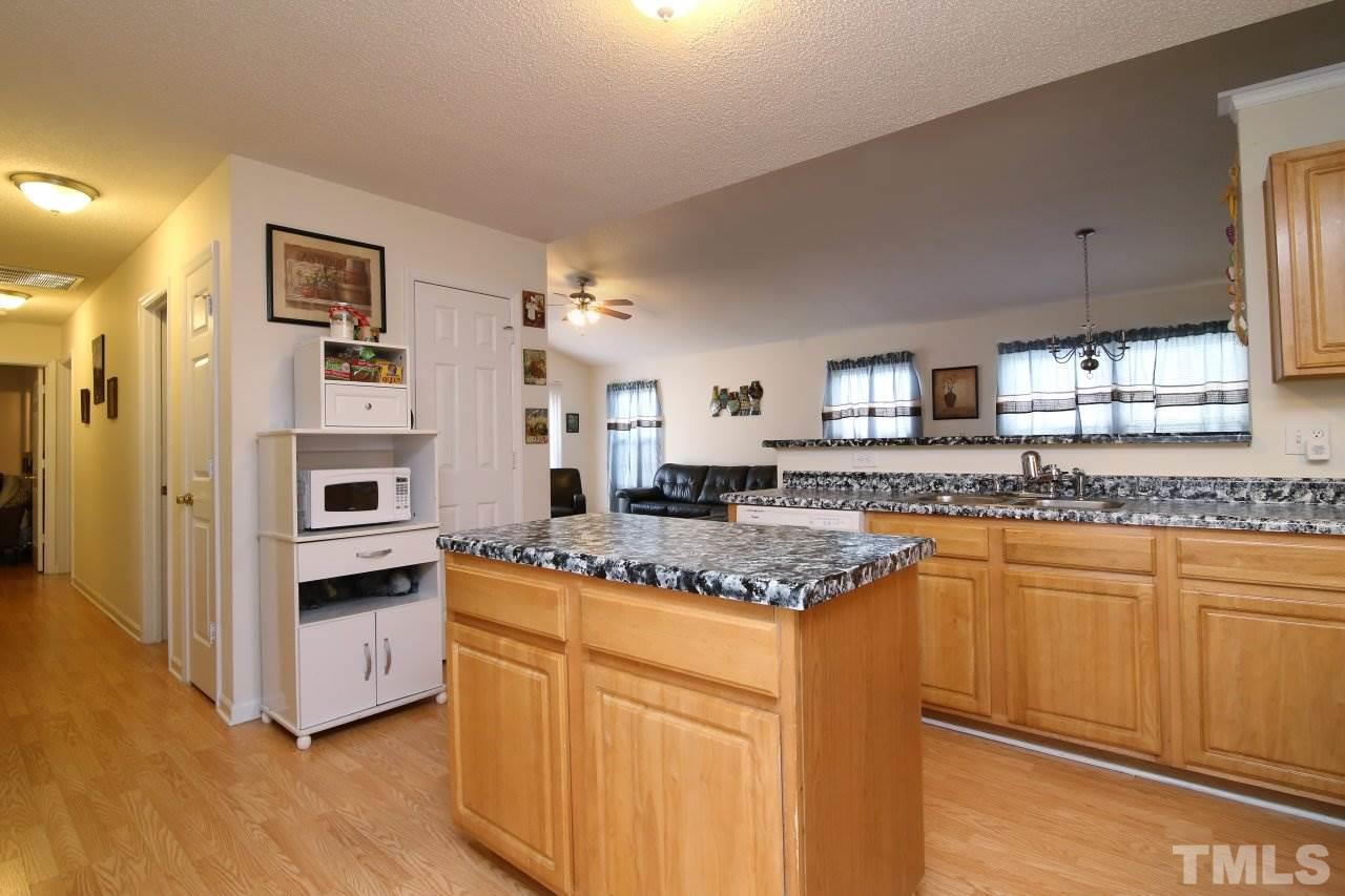 4725 Silverdene Street Raleigh, NC 27616 - Photo 14 of 25 Lots of countertops in kitchen