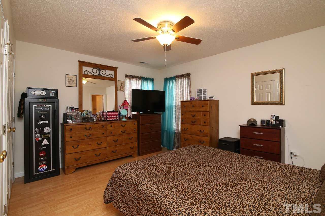 4725 Silverdene Street Raleigh, NC 27616 - Photo 16 of 25 Master bedroom with ceiling fan