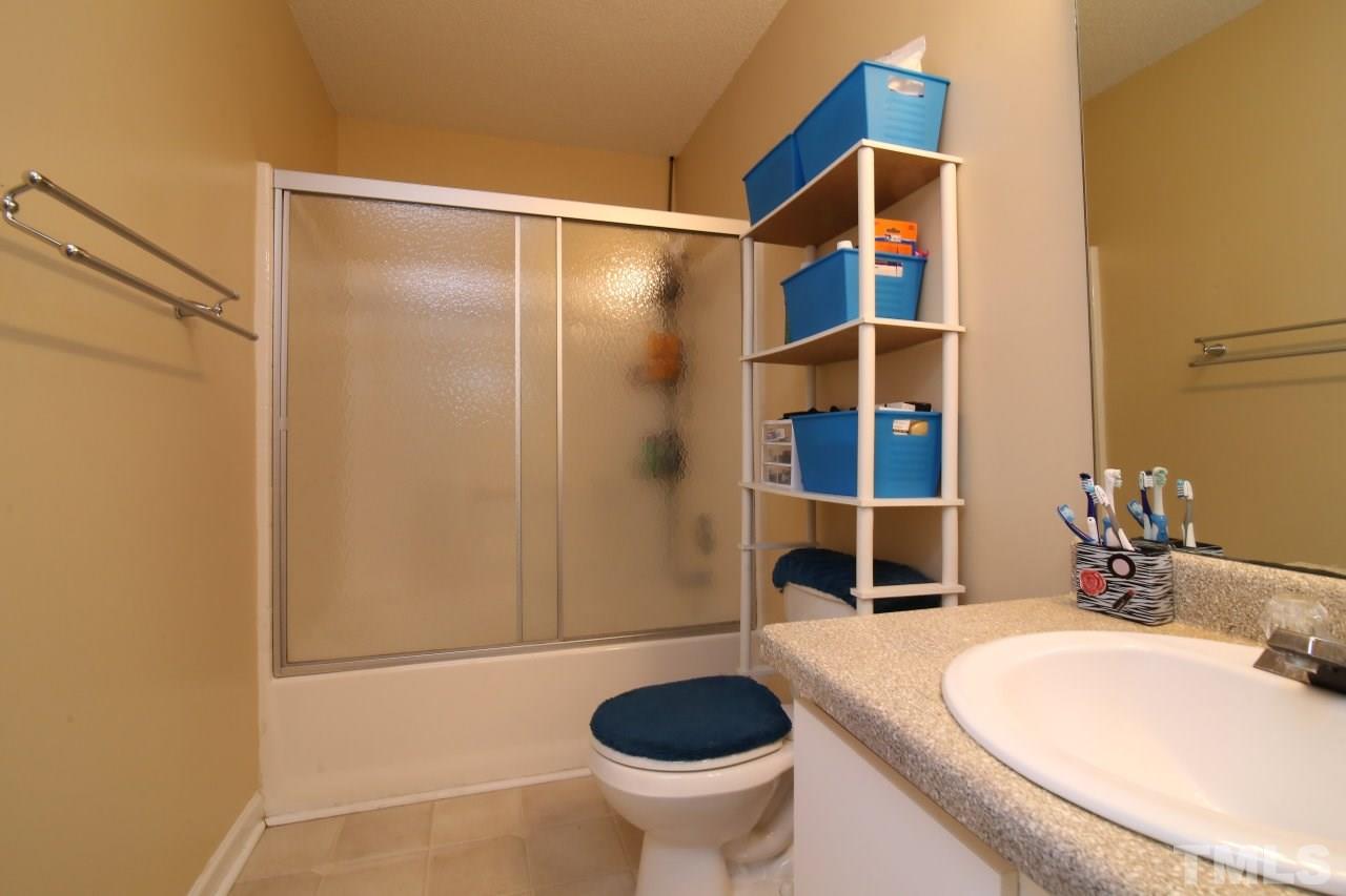 4725 Silverdene Street Raleigh, NC 27616 - Photo 18 of 25 Master bath with glass shower door