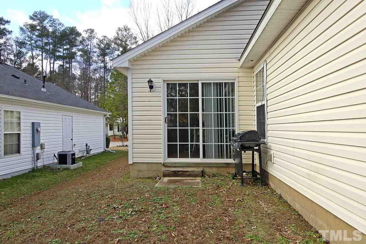 4725 Silverdene Street Raleigh, NC 27616 - Photo 23 of 25 Back of house at sliding door