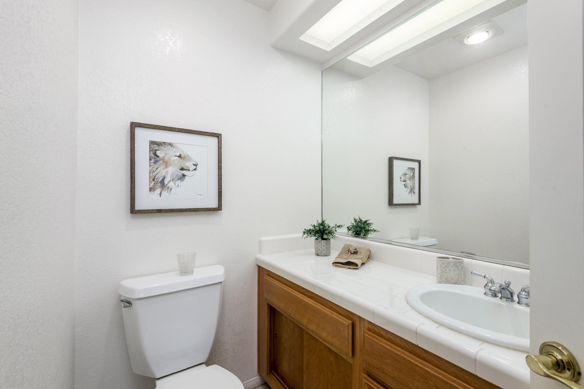 3715 Hitchcock Ranch Road Santa Barbara, CA 93105 - Photo 21 of 36 a bathroom with a toilet sink and mirror