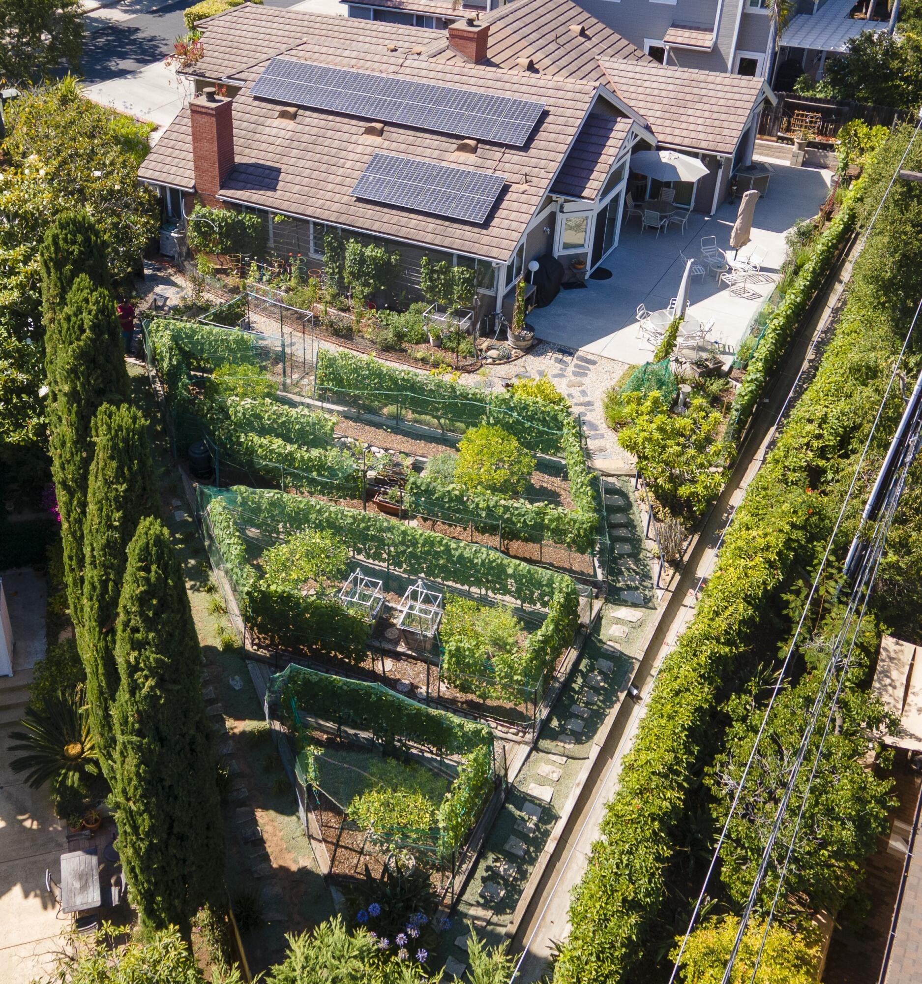 3715 Hitchcock Ranch Road Santa Barbara, CA 93105 - Photo 27 of 36 an aerial view of a house with a yard lake and outdoor seating