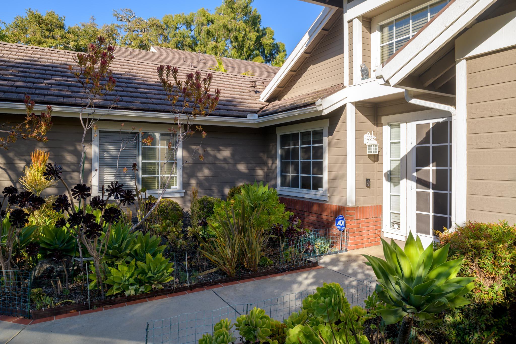 3715 Hitchcock Ranch Road Santa Barbara, CA 93105 - Photo 5 of 36 a front view of a house with garden