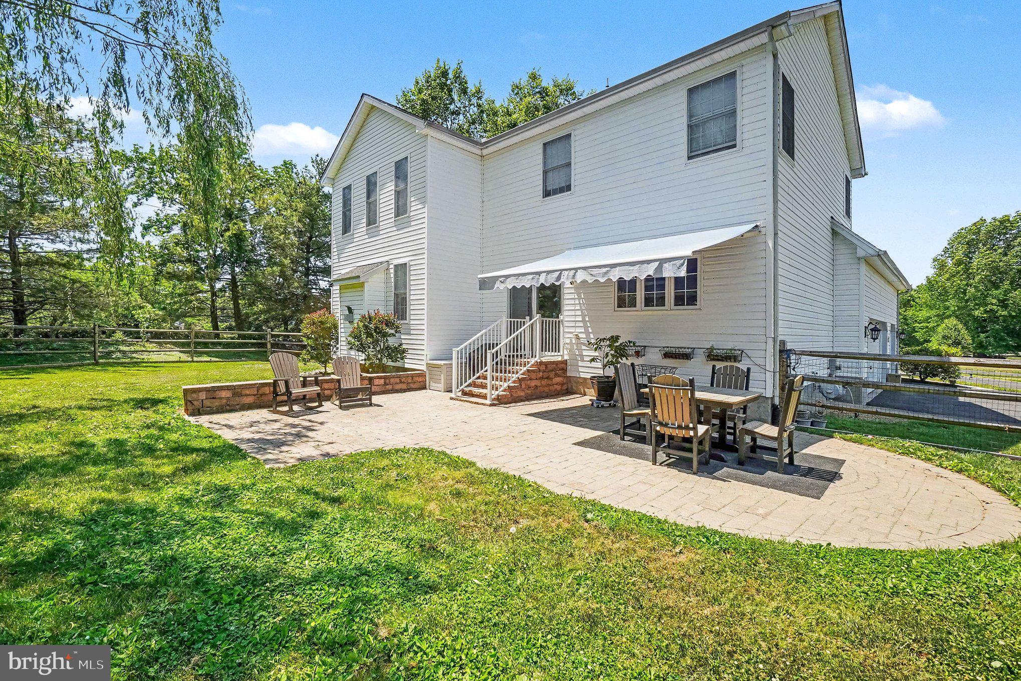 64 Open Meadow Court Elkton, MD 21921 - Photo 4 of 57 a view of a backyard with sitting area and furniture
