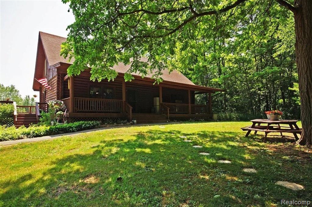 6122 Pingree Road Howell, MI 48843 - Photo 1 of 23 Front