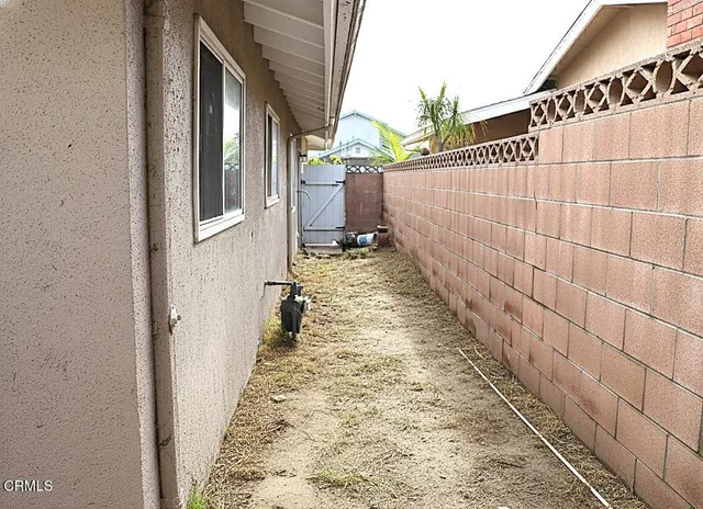 a view of a pathway with a building in the background