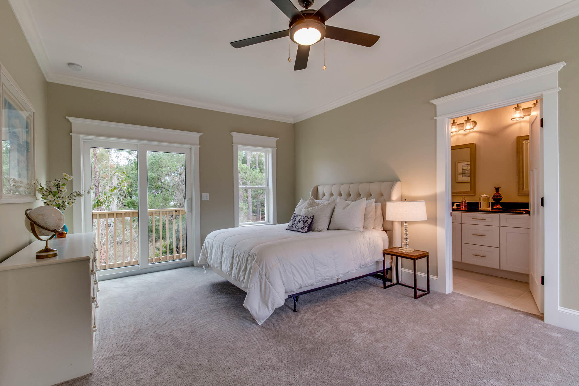148 Rearden Way Santa Rosa Beach, FL 32459 - Photo 21 of 43 a spacious bedroom with a bed and a chandelier