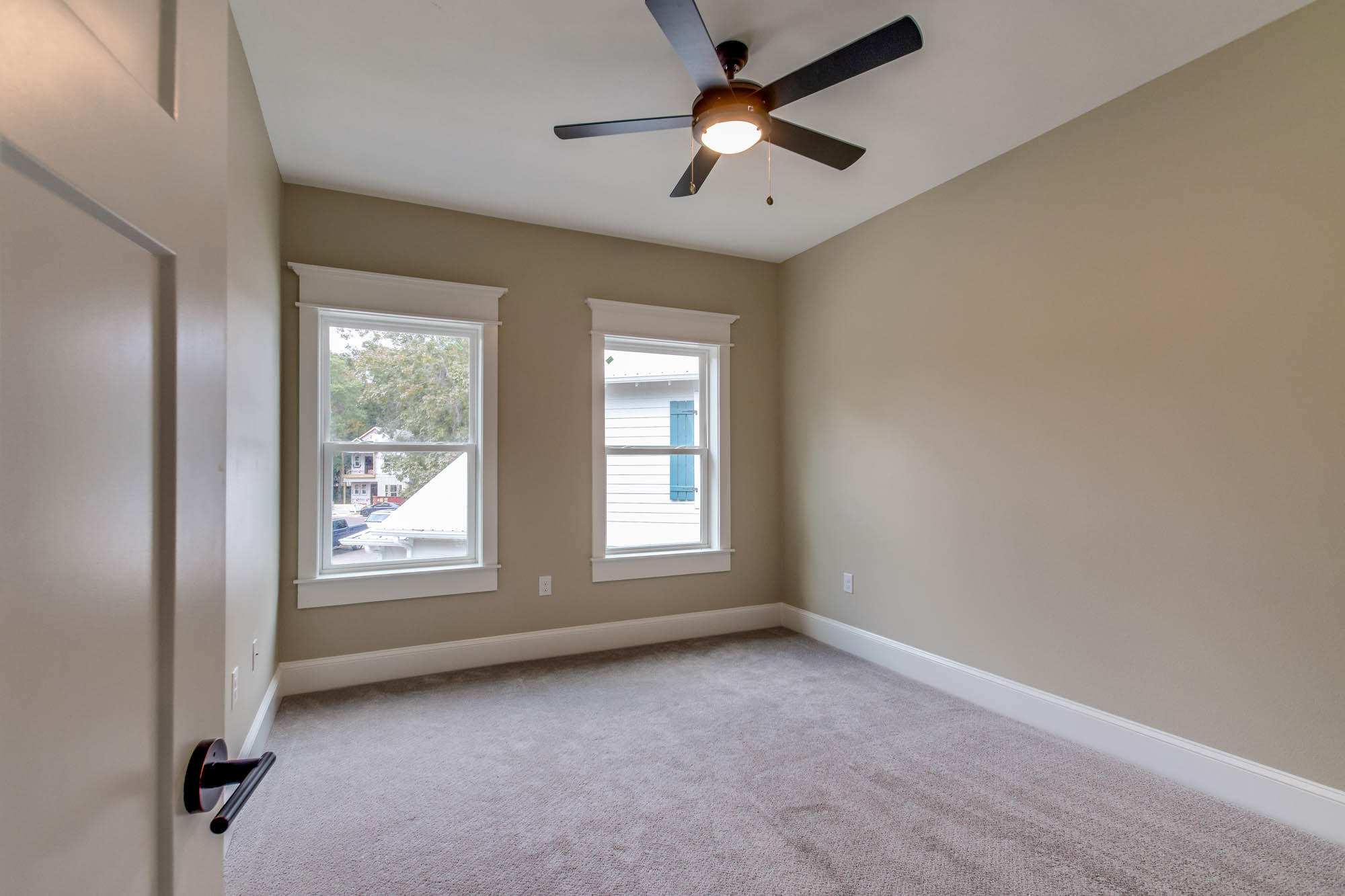 148 Rearden Way Santa Rosa Beach, FL 32459 - Photo 32 of 43 an empty room with ceiling fan and windows